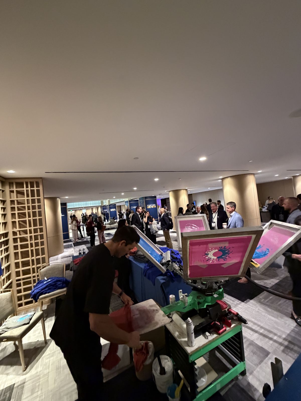 Merch Troop live printing — presses rolling at the event